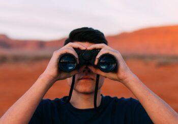 How Can I Watch Bridge - Man with binoculars - Great Bridge Links